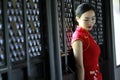 Chinese cheongsam model in Chinese classical garden Royalty Free Stock Photo